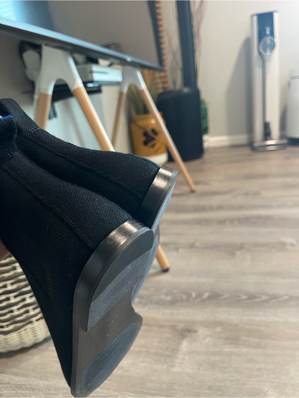 Rothy’s Merino Ankle Boots in onyx black with a distinctive blue pull tab - Picture 11 of 13